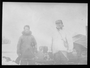 Image of Two White men at camp site